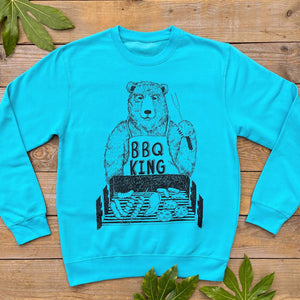blue jumper with BBQ King on