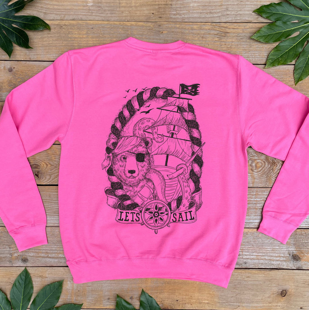 pink jumper with pirate bear and ship design
