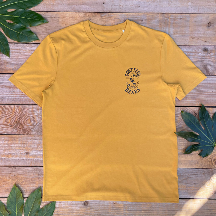 mustard tee with anchor logo