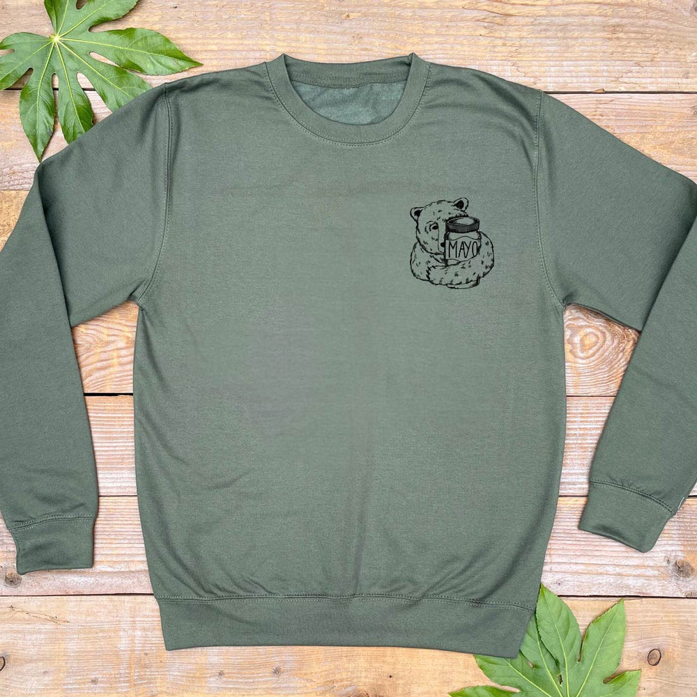 bear and mayo jar on green jumper