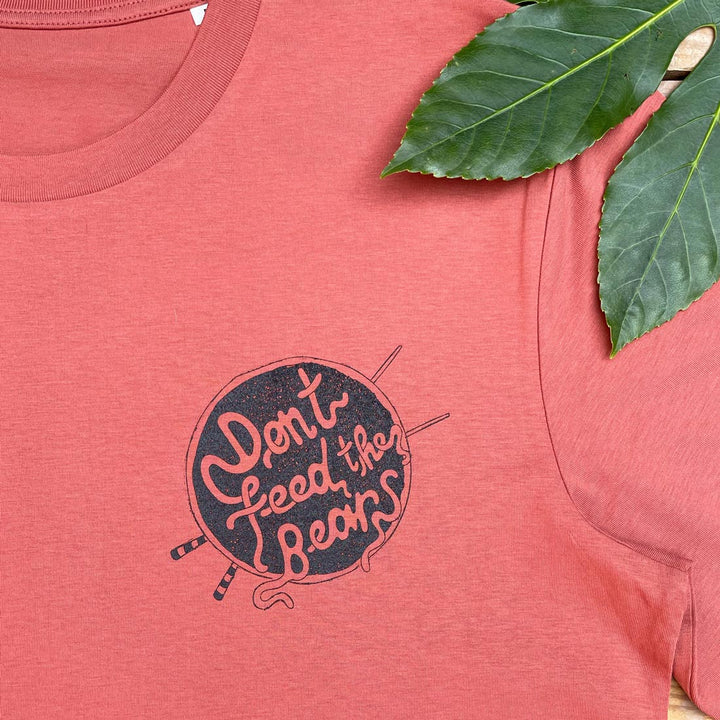 close up of brown tee and noodles design