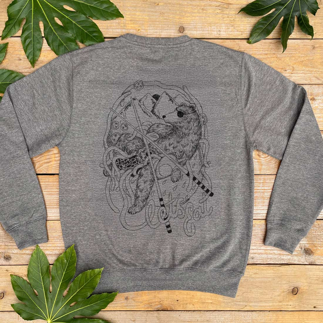 grey jumper with bear and noodle bowl