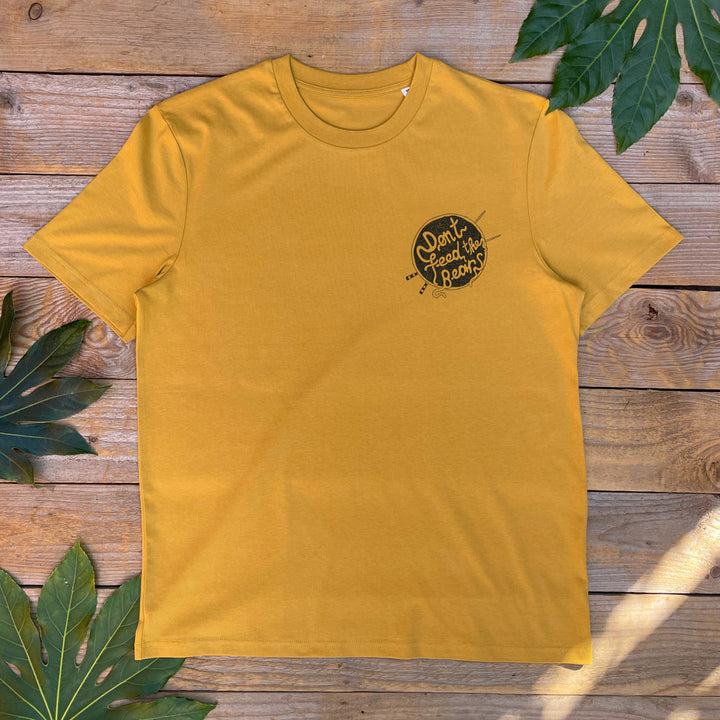 mustard tee with DFTB logo