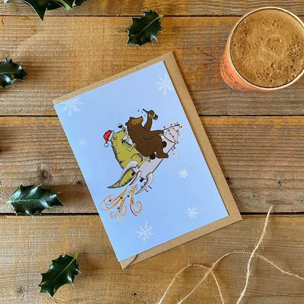 bear riding a rocket christmas card