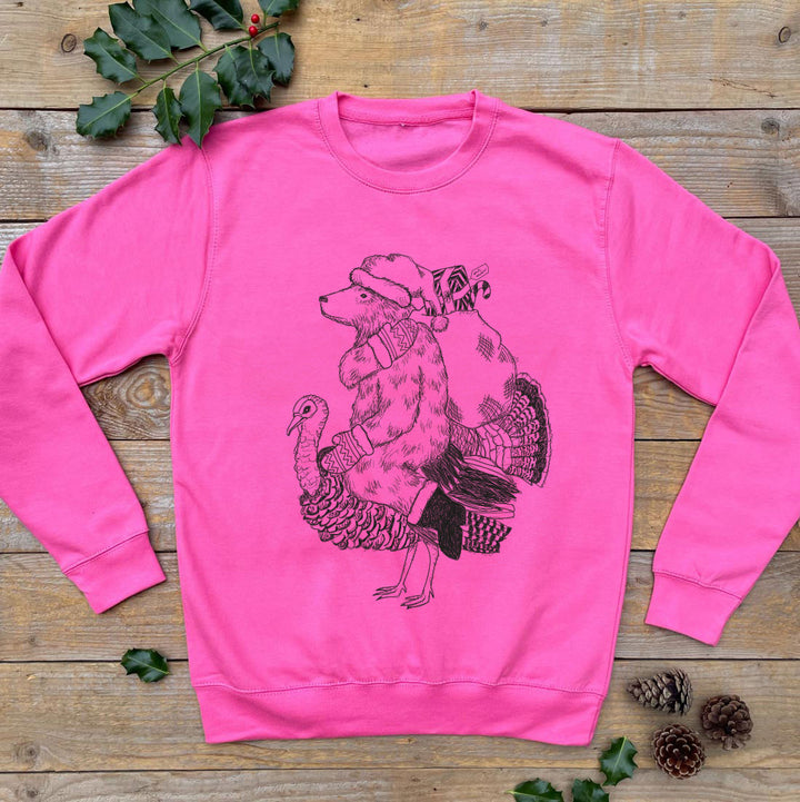 pink christmas jumper with bear and santa hat