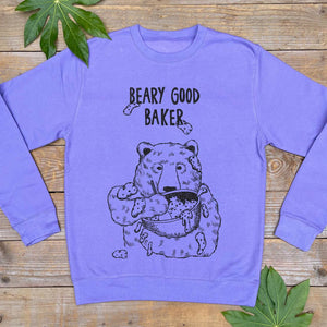 purple jumper with bear and baking bowl