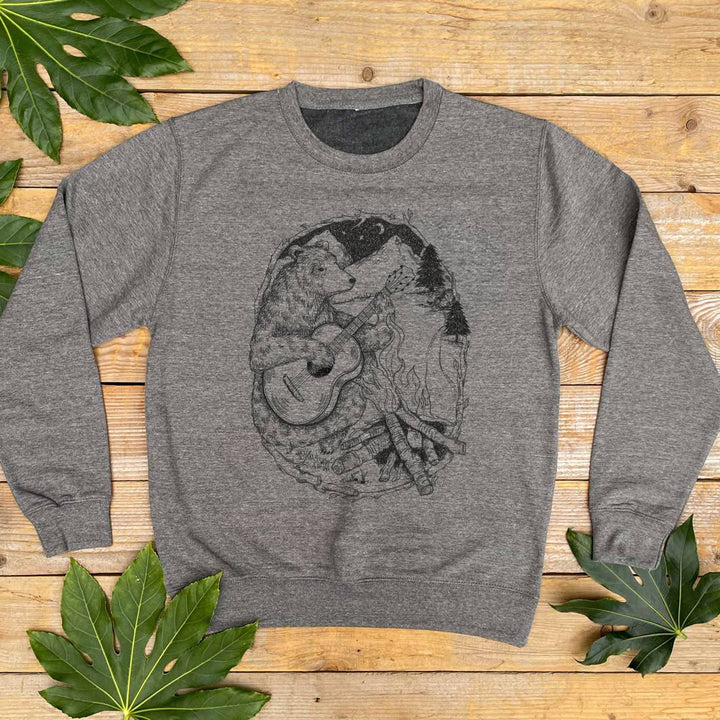 grey jumper with campfire and bear
