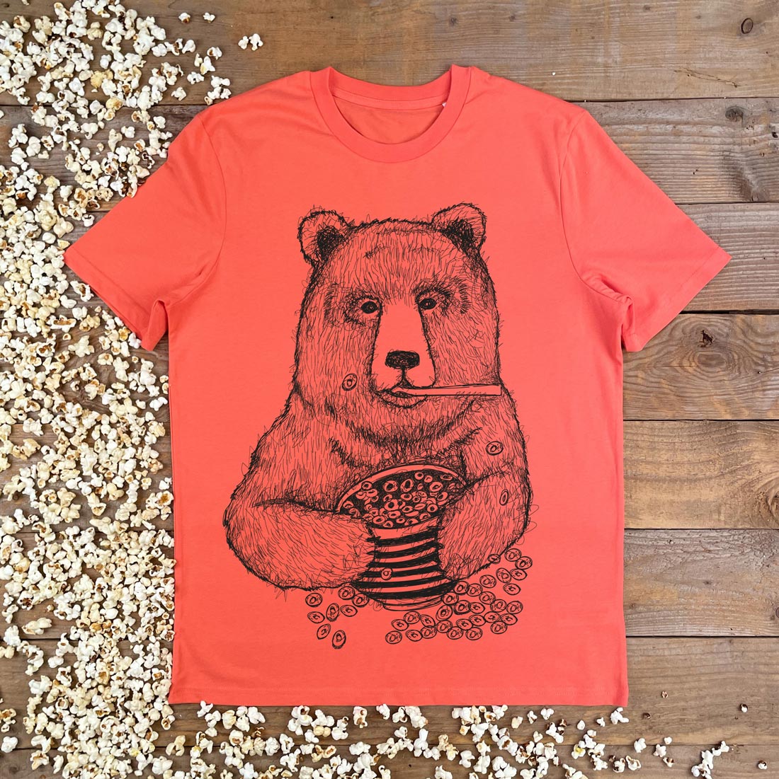 bear eating cereal orangey tshirt
