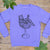 bear sat in wine glass purple jumper