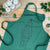 green christmas apron with a bear dressed as tree
