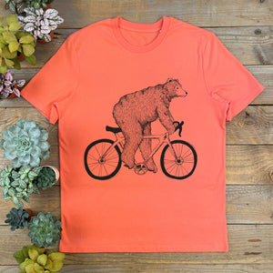 bear riding racer bike, orange tshirt