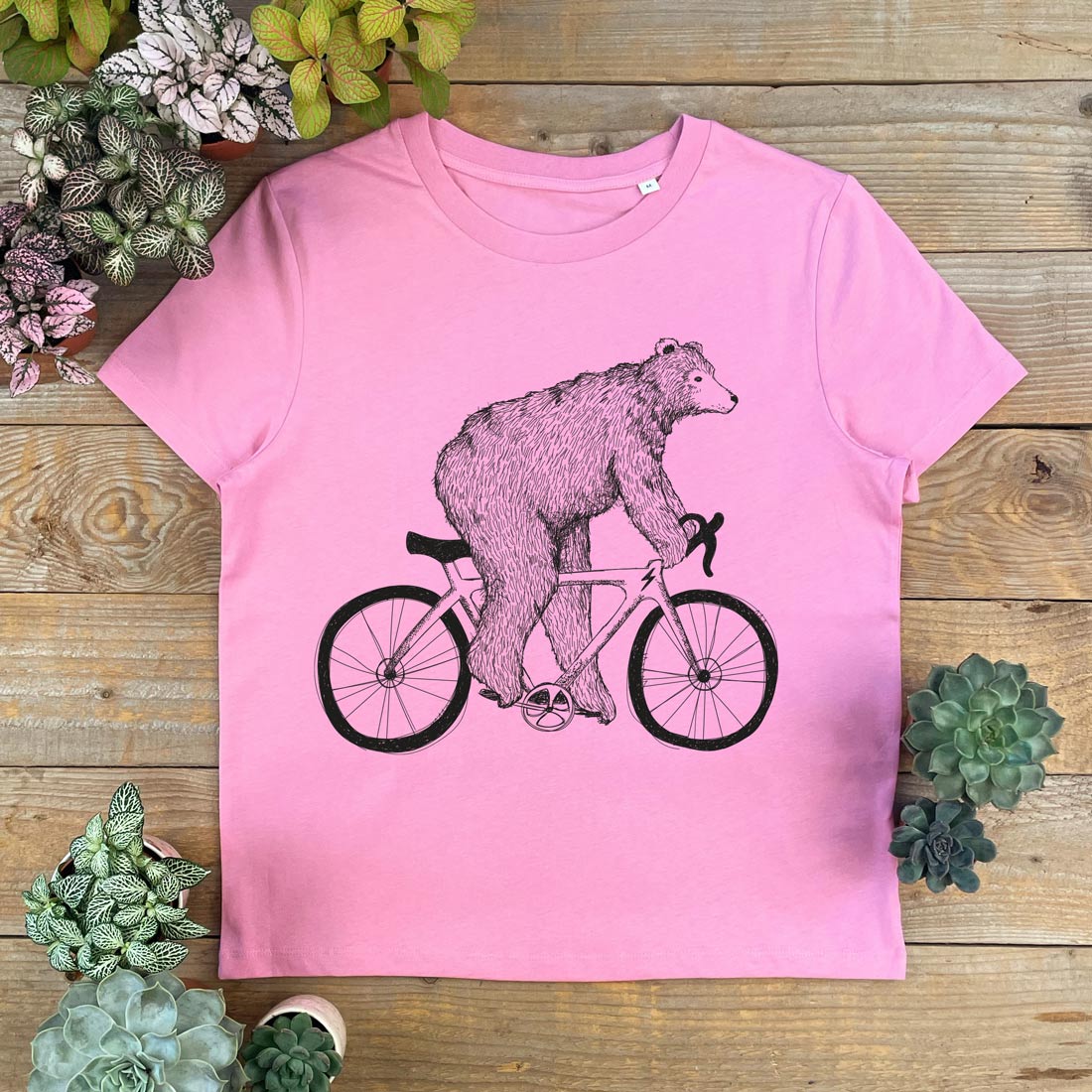 Bear riding racer bike pink womens tshirt