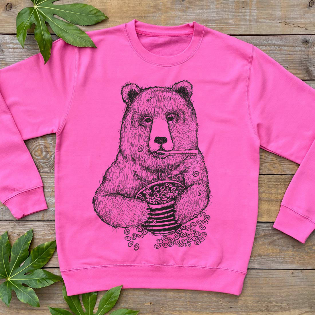 bear eating breakfast pink jumper