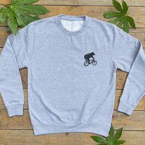 bear riding bike grey sweater