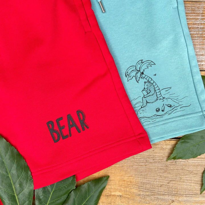 red and green shorts photographed together