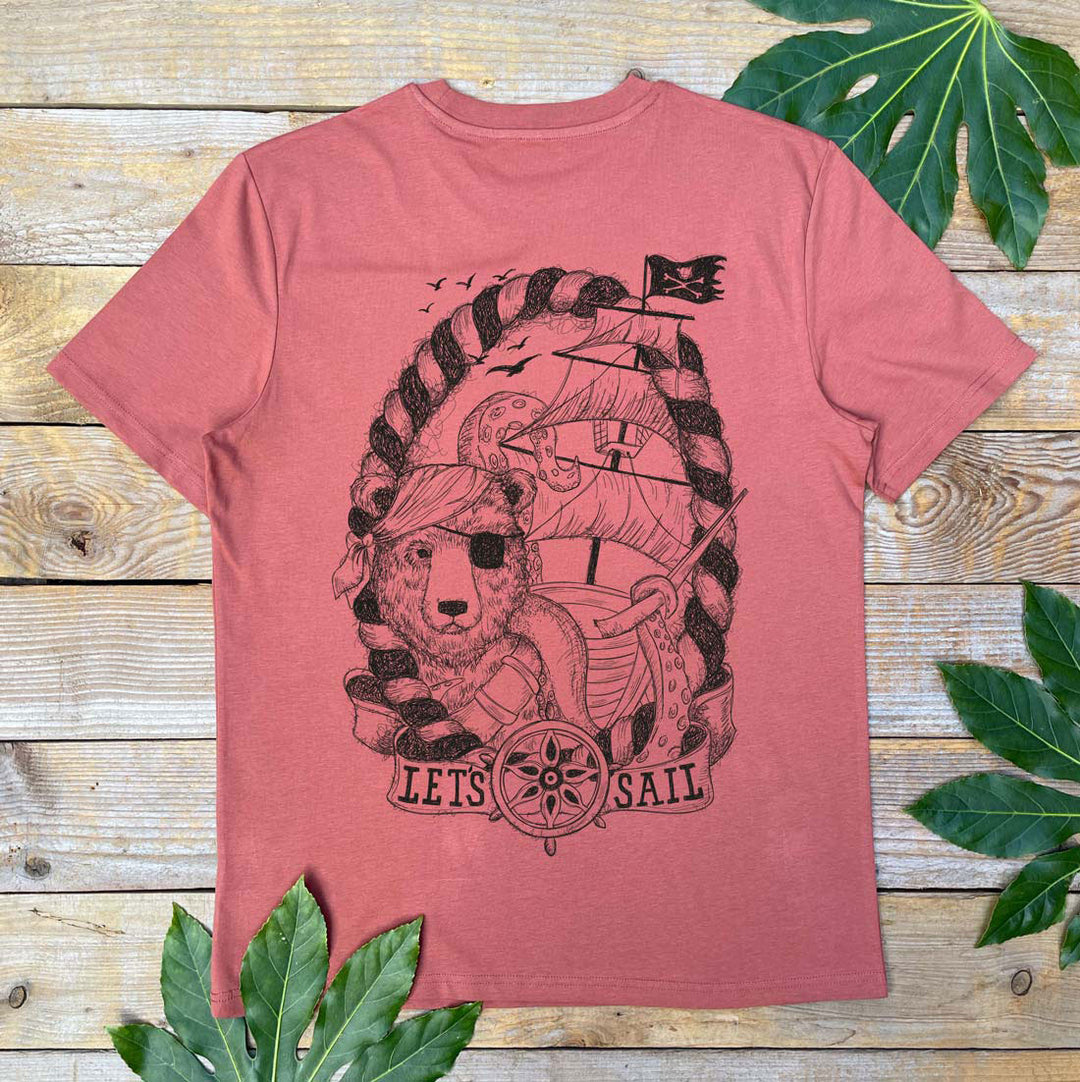 brown tee on boards with bear print