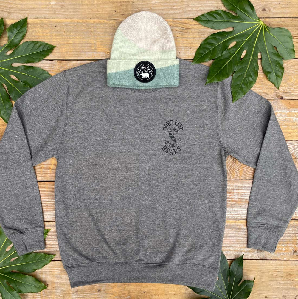 grey jumper with anchor design