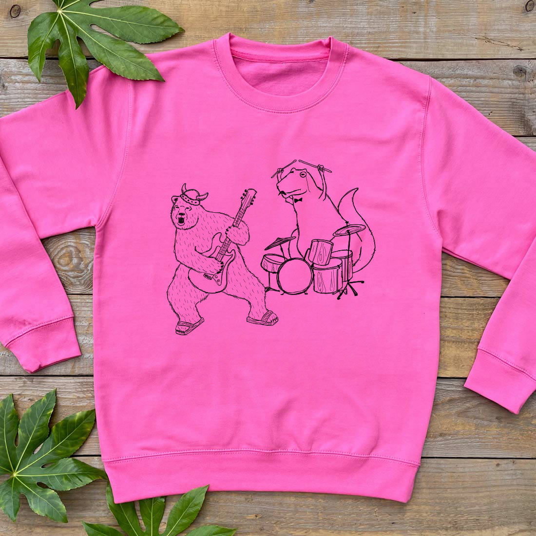 bear and dino in rock band pink jumper