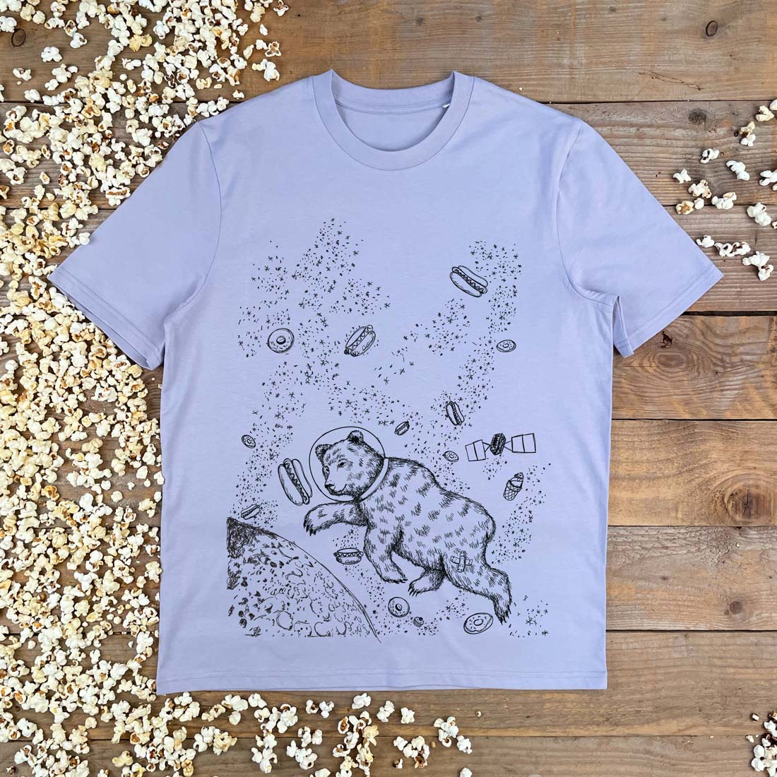 lilac teshirt with bear and hot dogs in space