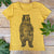 mustard tshirt with bear standing