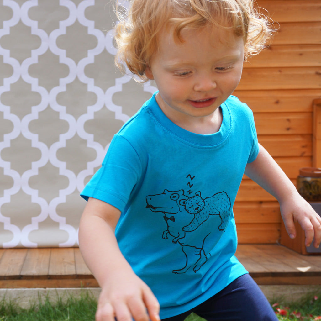 childs wearing bear and dino tshirt