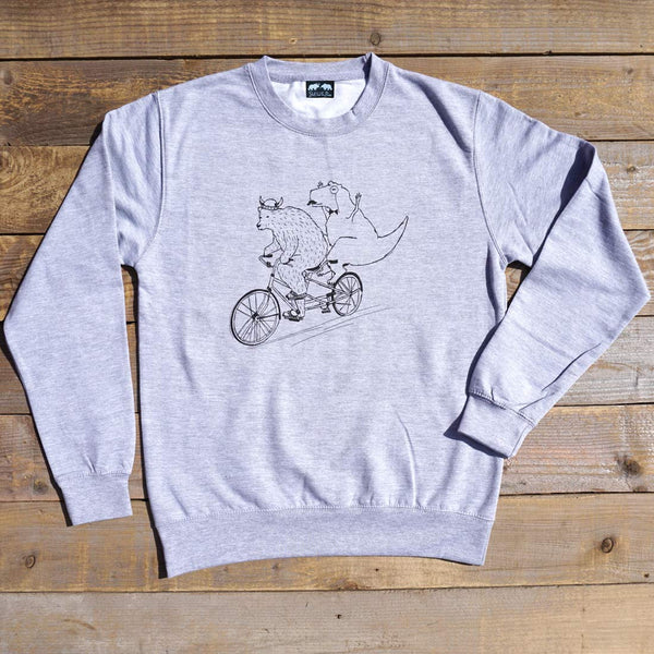 Bear riding tandem bike