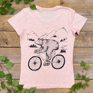 bear riding a racer bike