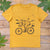 bear on bicycle mustard tee