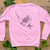 pink jumper with narwhal, bear and dinosaur