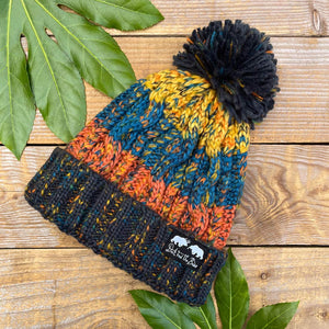 orange and blue bobble hat